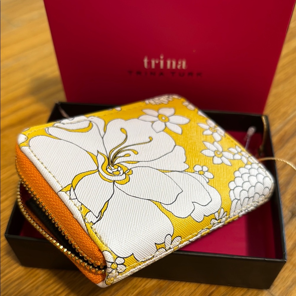 Trina Turk Orange and White Wallets with Elegant Floral Design